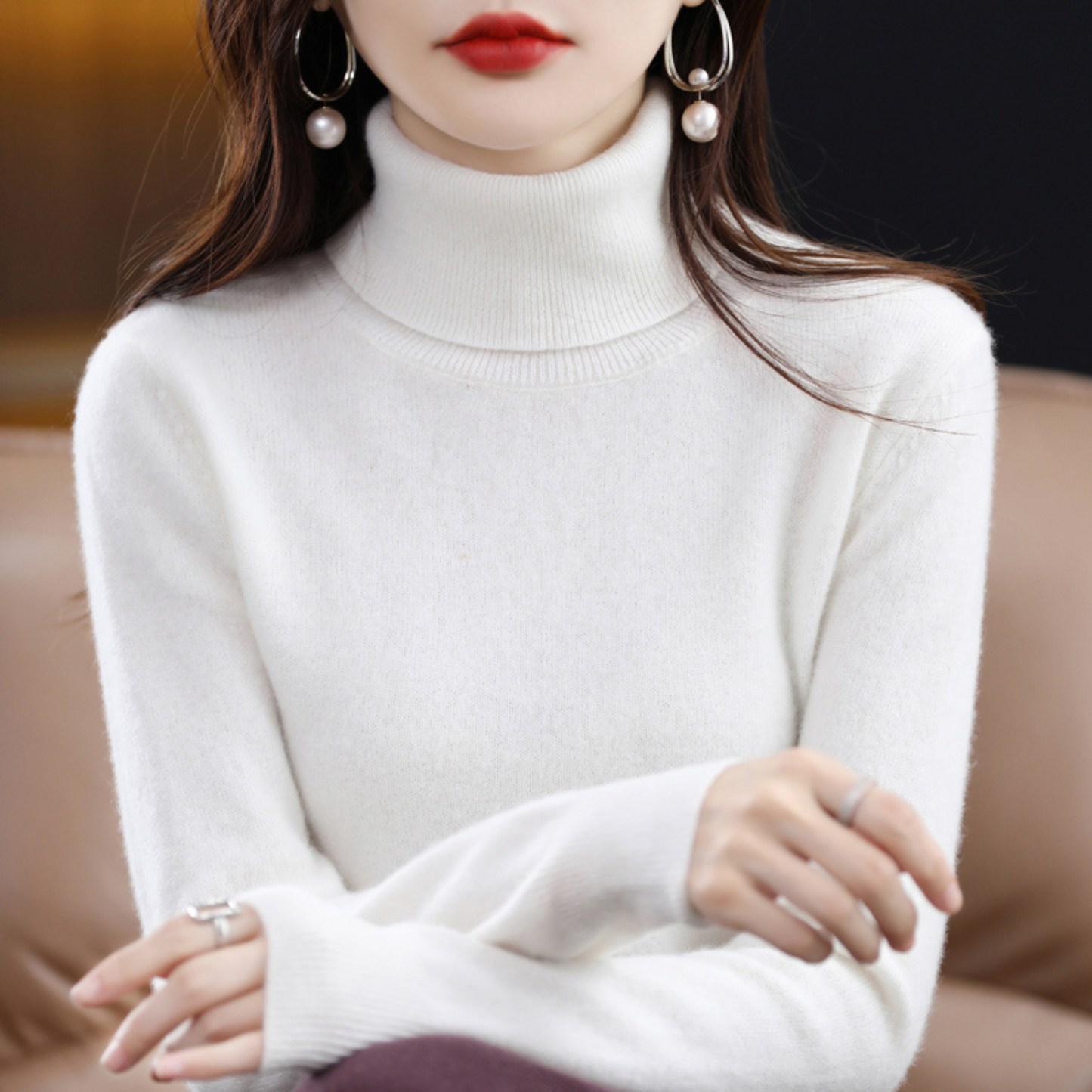 Light blue cashmere roll neck jumper with a cosy, elegant finish for autumn layering