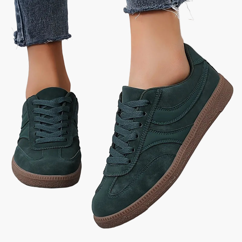 Women's brown retro low top trainers with a vintage-inspired finish