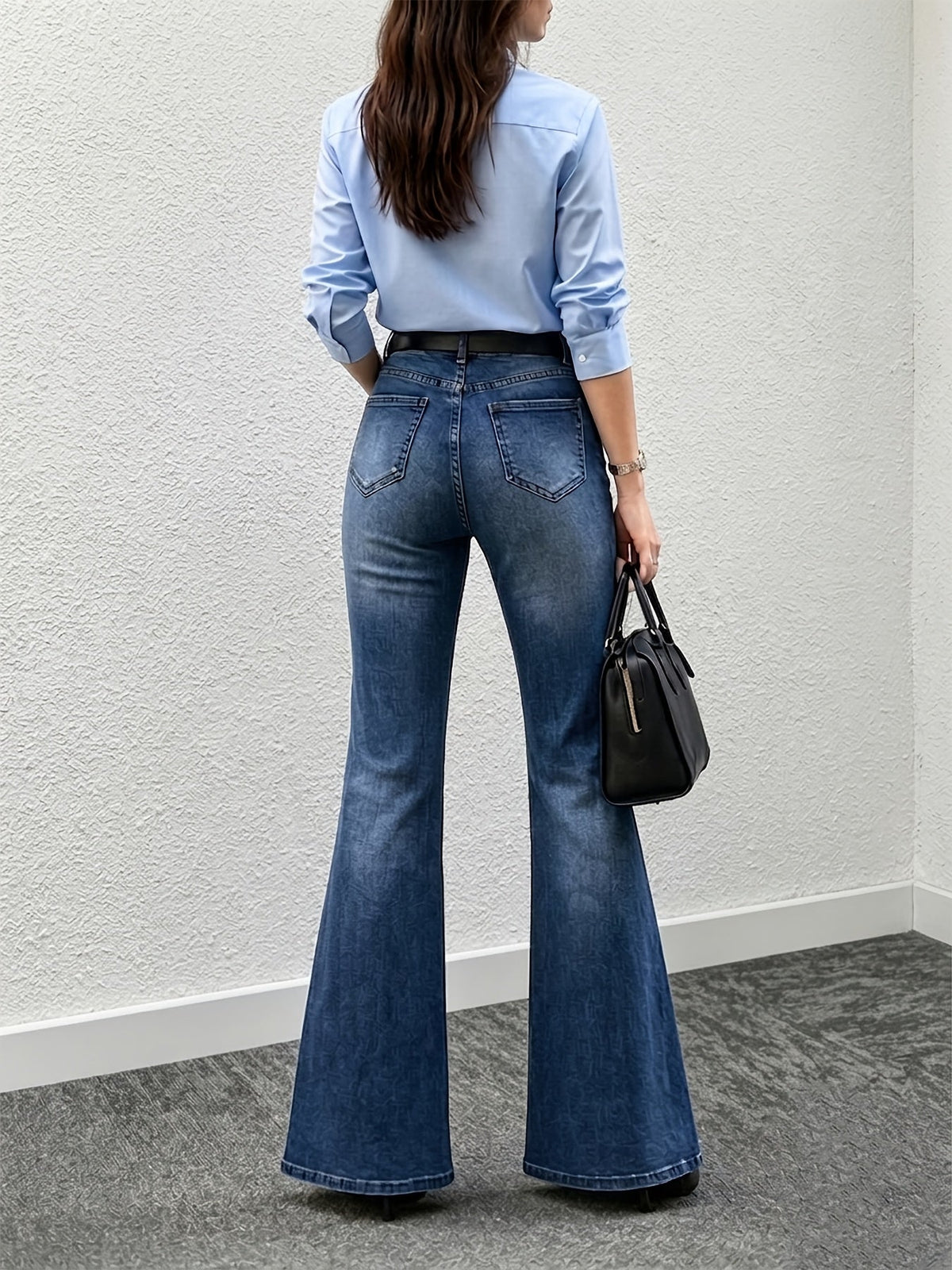 Women's high waisted flared jeans in soft structured denim, front view