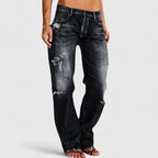 Women's black baggy distressed jeans with a relaxed leg and high stretch fabric