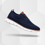 Men's navy knit oxford style trainers with a lightweight sole