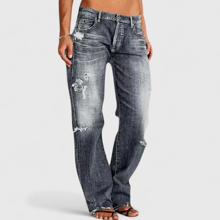 Women's grey baggy distressed jeans with a relaxed leg and high stretch fabric