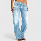 Women's light blue baggy distressed jeans with a relaxed leg and high stretch fabric