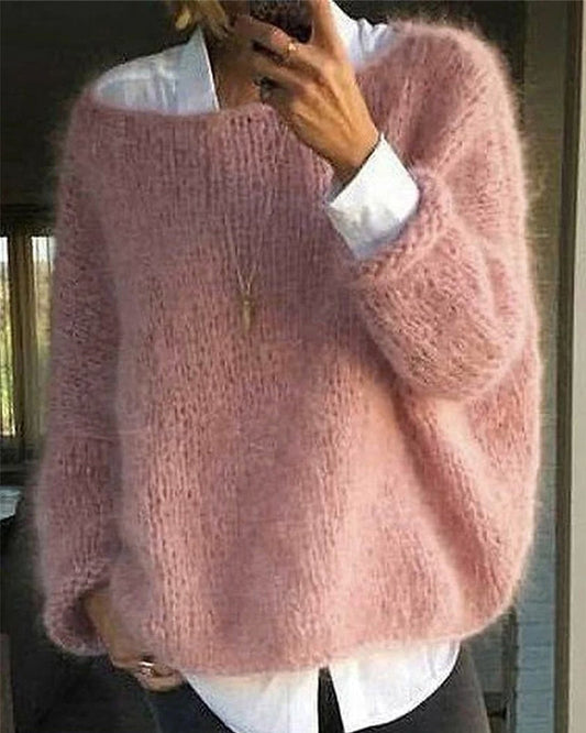 Pink longline knit jumper with long sleeves for transitional layering