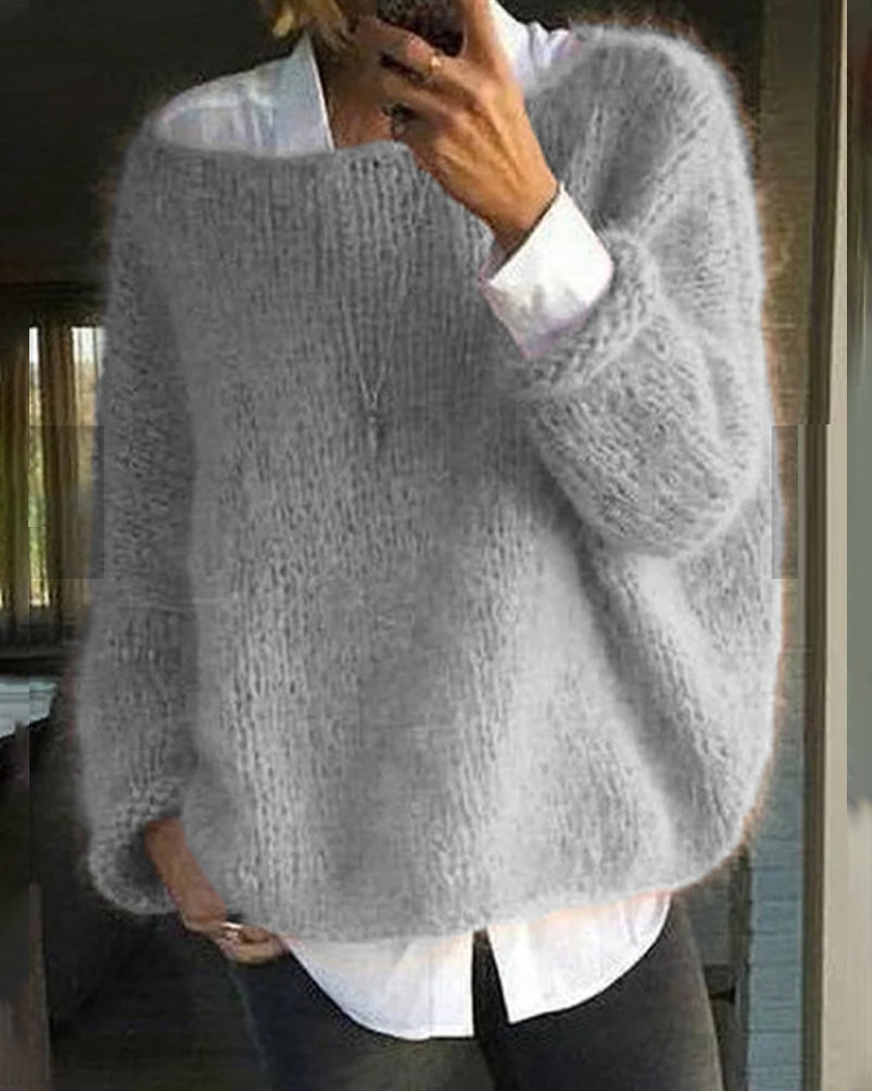 Pink longline knit jumper with long sleeves for transitional layering