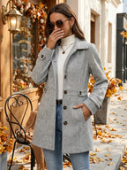 Grey herringbone coat with a waist-defining belt
