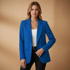Women's black tailored blazer with a notched lapel and cotton blend finish