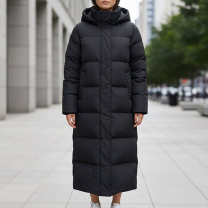 Women's black quilted puffer parka featuring a waterproof hood