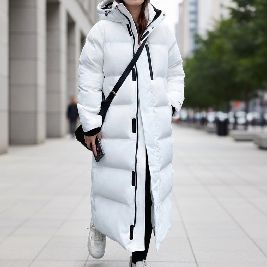 Women's black quilted puffer parka featuring a waterproof hood