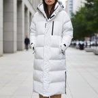 Women's black quilted puffer parka featuring a waterproof hood