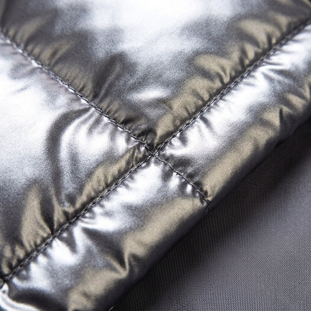 Women's light grey quilted padded gilet with an insulated fill