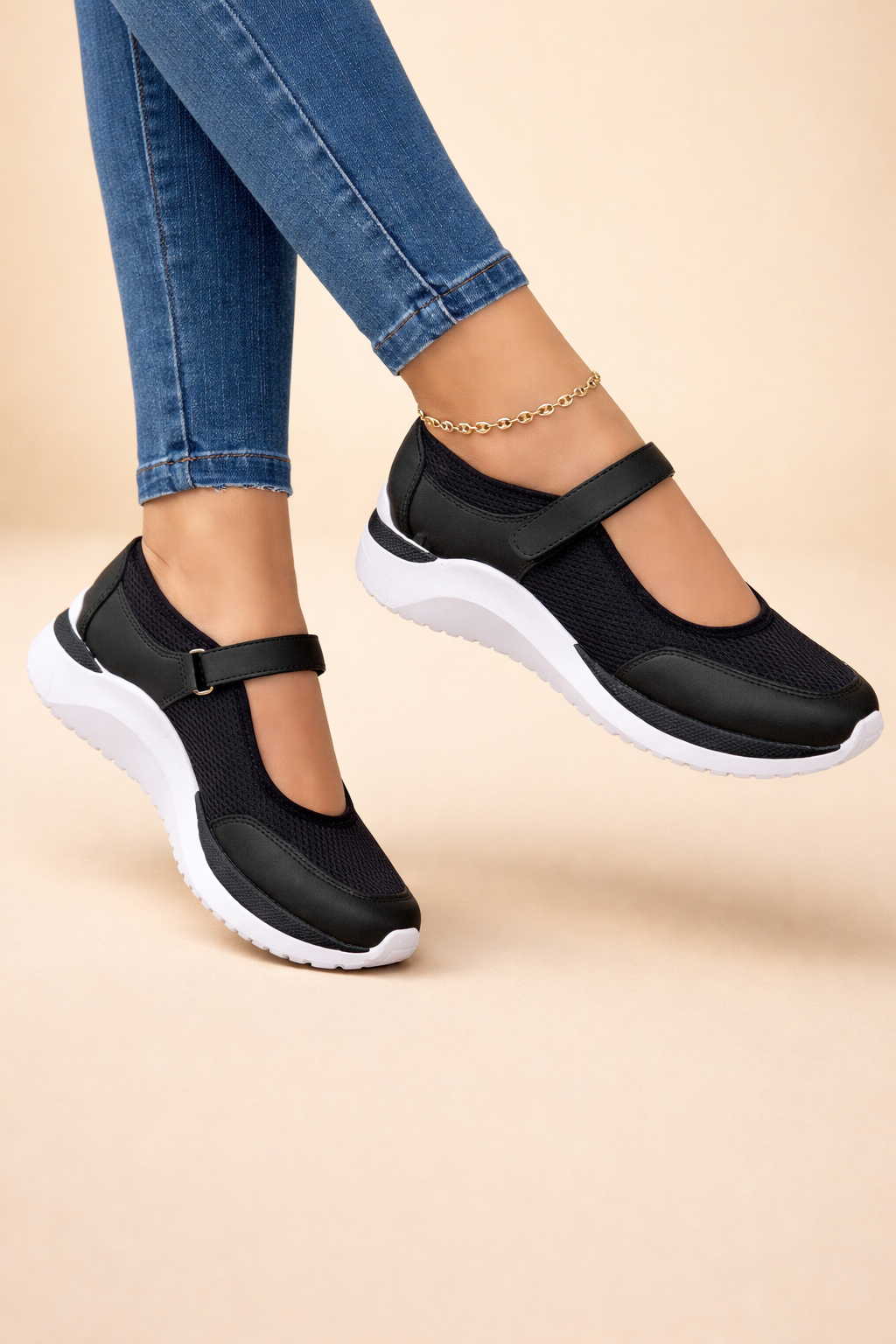 Women's white Mary Jane trainers with a cushioned strap detail