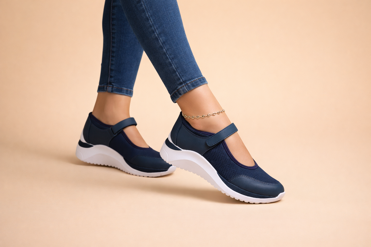 Women's white Mary Jane trainers with a cushioned strap detail