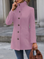 Waist-cinching mid-length coat with tailored belt, product still life