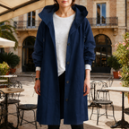 Women's silver mist hooded waterproof trench coat with a tailored fit
