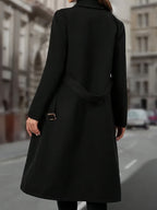 Black double-breasted long coat with wide lapel