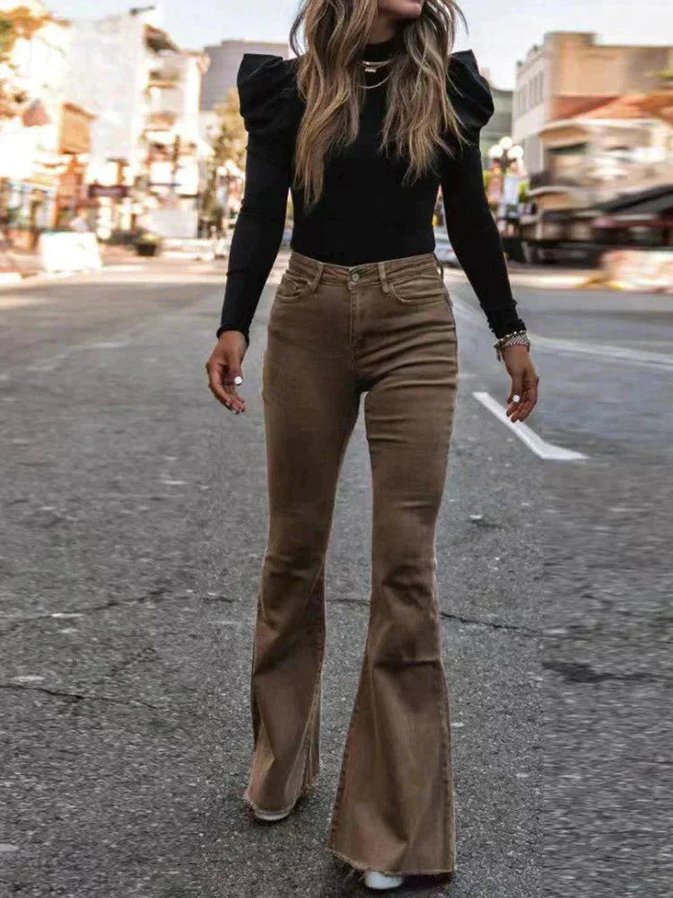Women's flared corduroy trousers in orange