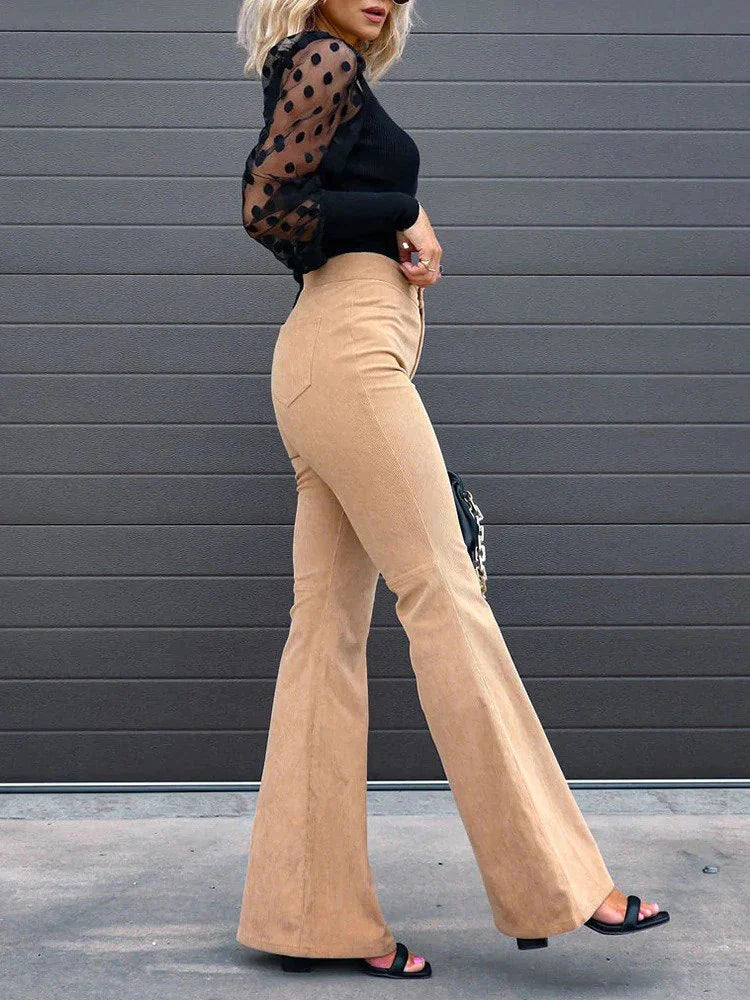 Women's flared corduroy trousers in orange