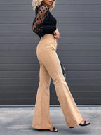 Women's flared corduroy trousers in orange