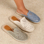 Woven slip-on mules, side view