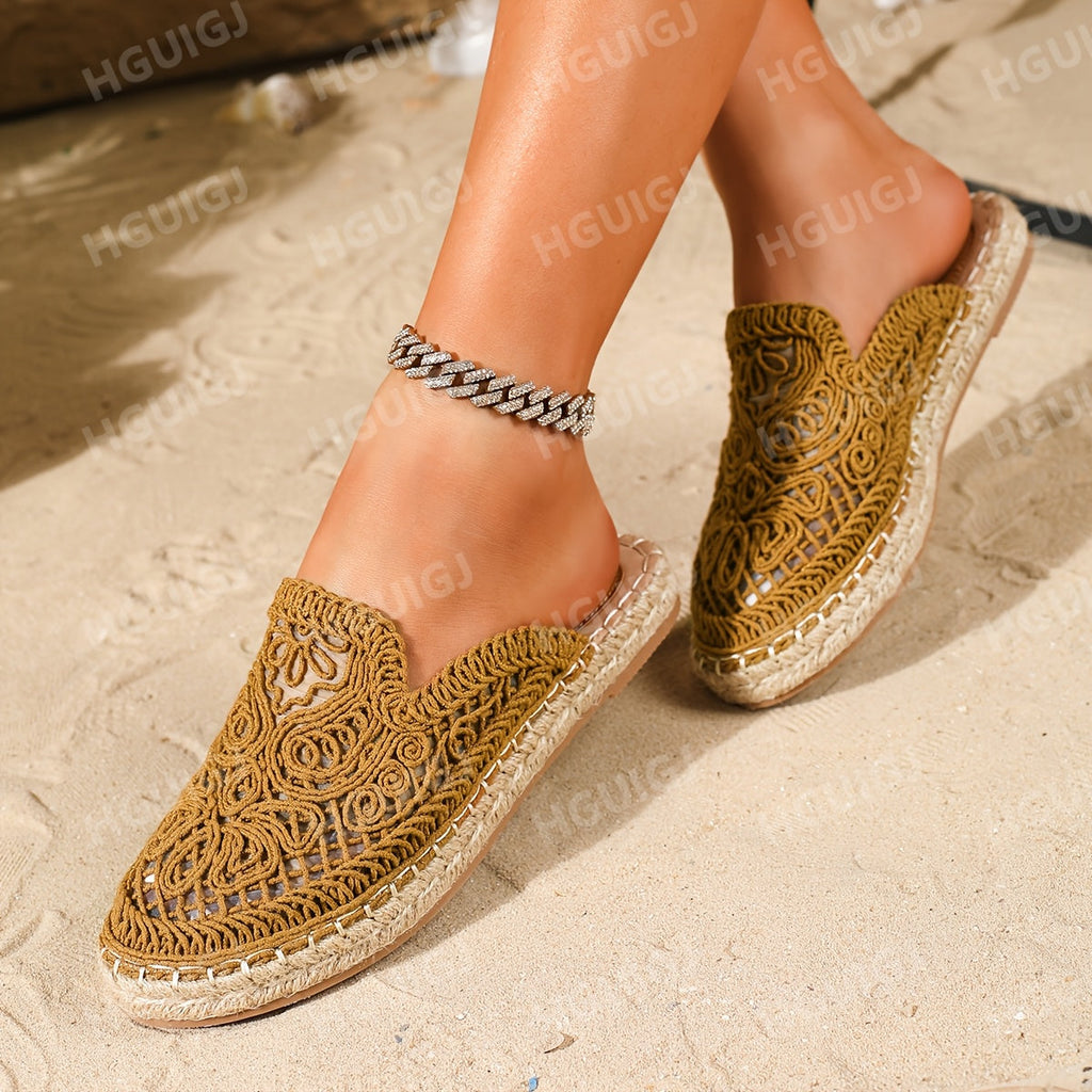 Close-up of stitching detail on woven slip-on mules