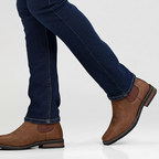 Men's leather Chelsea boots with elastic side panel, product still life