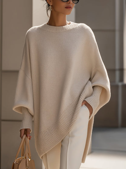 Women's beige relaxed fit knit jumper with a soft, graceful drape