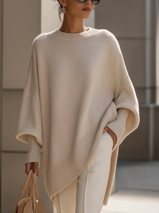 Women's beige relaxed fit knit jumper with a soft, graceful drape