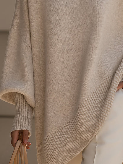 Women's beige relaxed fit knit jumper with a soft, graceful drape