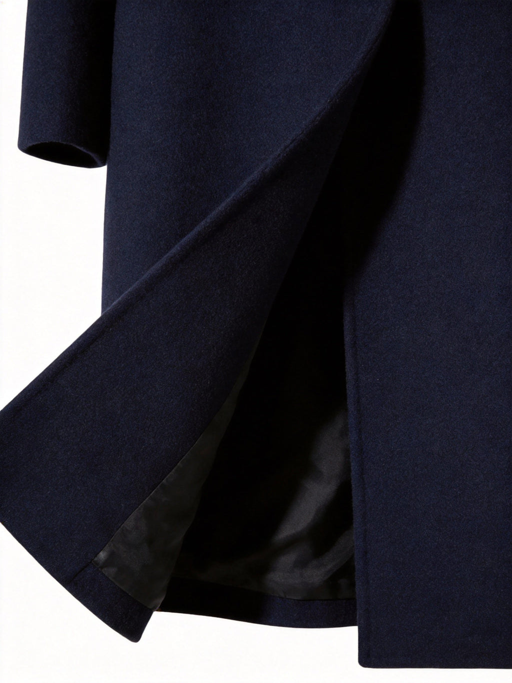 Close-up of belt detail on long trench coat