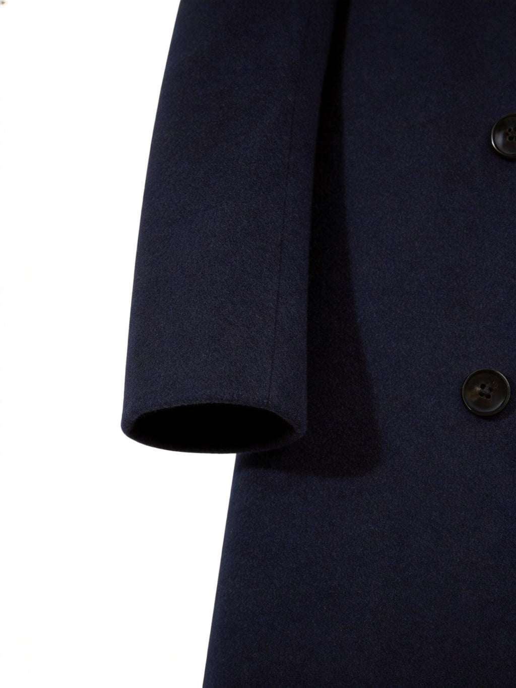 Close-up of button fastening on long trench coat