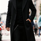 Close-up of pocket detail on long trench coat