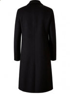 Close-up of fabric texture on long trench coat