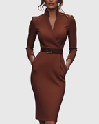 Women's classic midi dress with fitted waist and flowing skirt