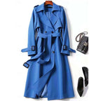 Belted long trench coat with lapel collar, product still life