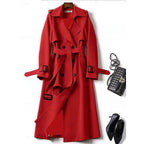 Belted long trench coat with lapel collar, product still life