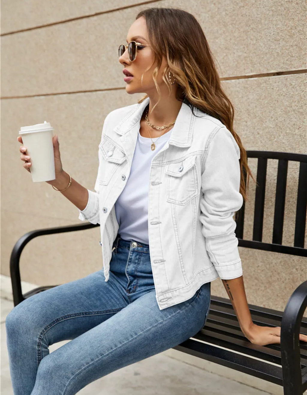 Women's white classic cropped denim jacket with chest pockets and buttons