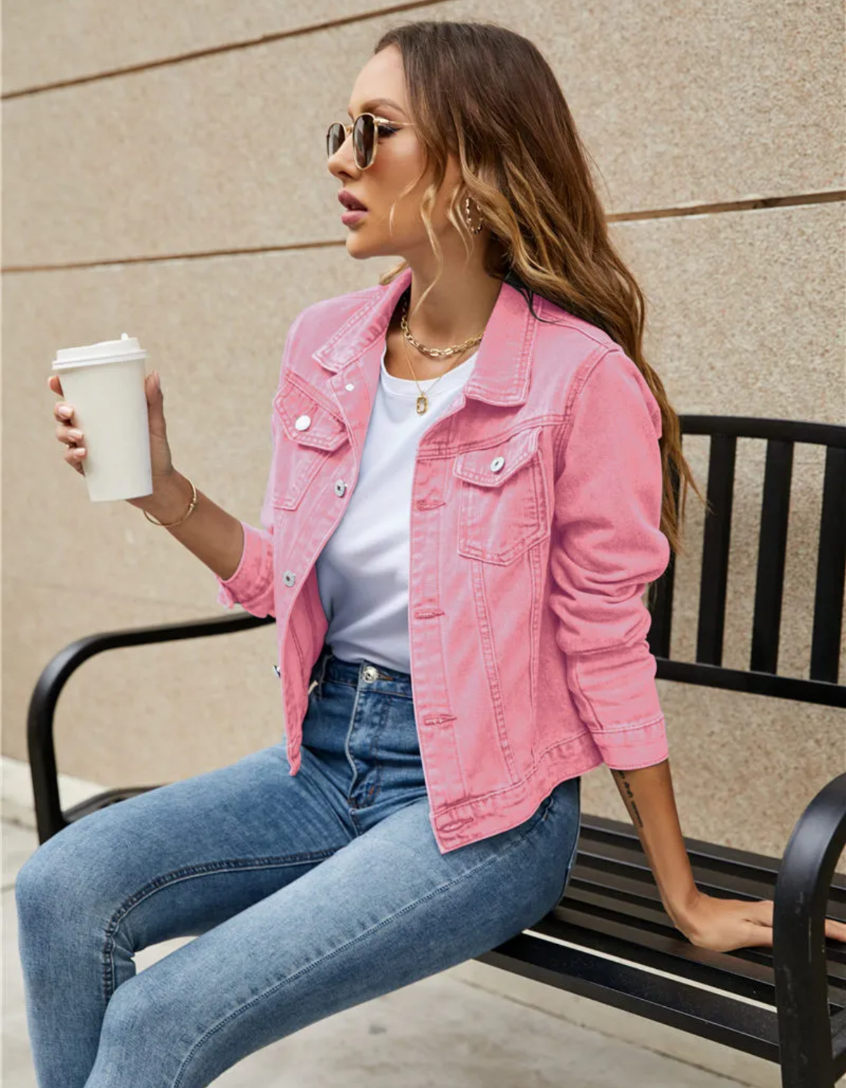 Women's pink classic cropped denim jacket with chest pockets and buttons