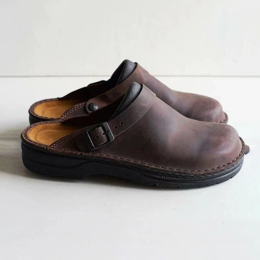 Brown men's faux leather moccasin slippers with a non-slip sole
