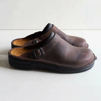 Brown men's faux leather moccasin slippers with a non-slip sole