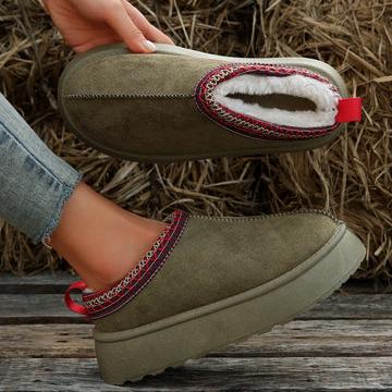 Platform slip-on clogs with chunky sole, product still life