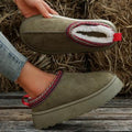Platform slip-on clogs with chunky sole, product still life