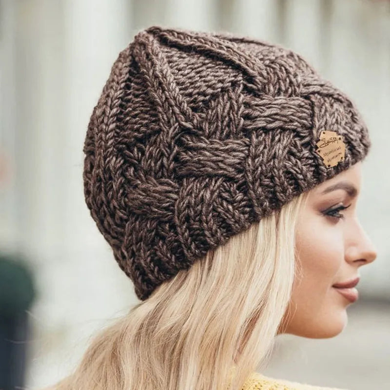 Unisex beige chunky thermal knitted beanie with a snug, warm fit