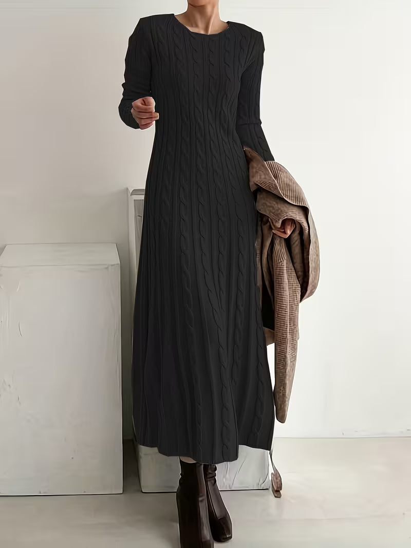 Women's black cable knit maxi jumper dress with long sleeves and a round neck