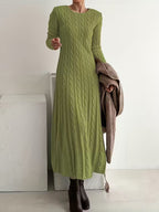 Women's olive green cable knit maxi jumper dress with long sleeves and a round neck