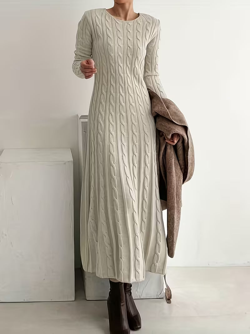 Women's cream cable knit maxi jumper dress with long sleeves and a round neck