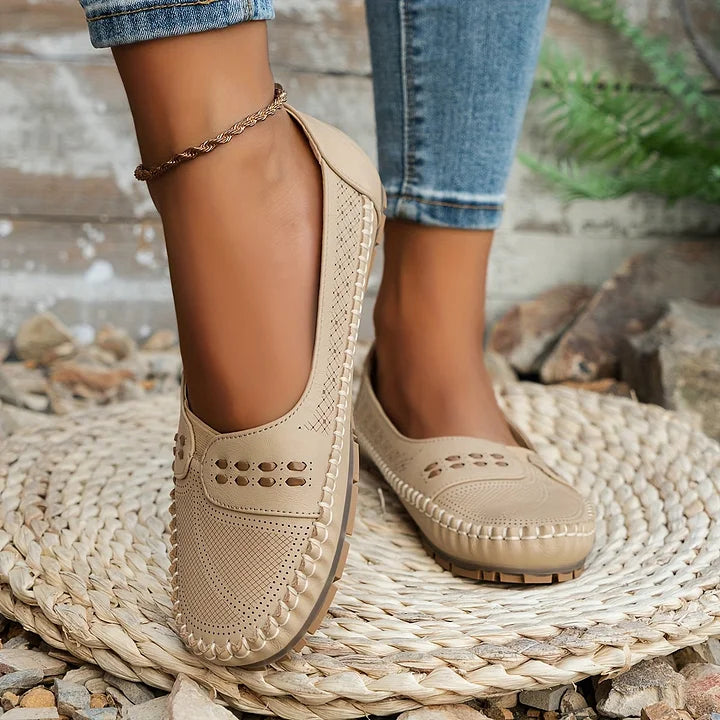 Close-up of stitching detail on casual slip-on shoes