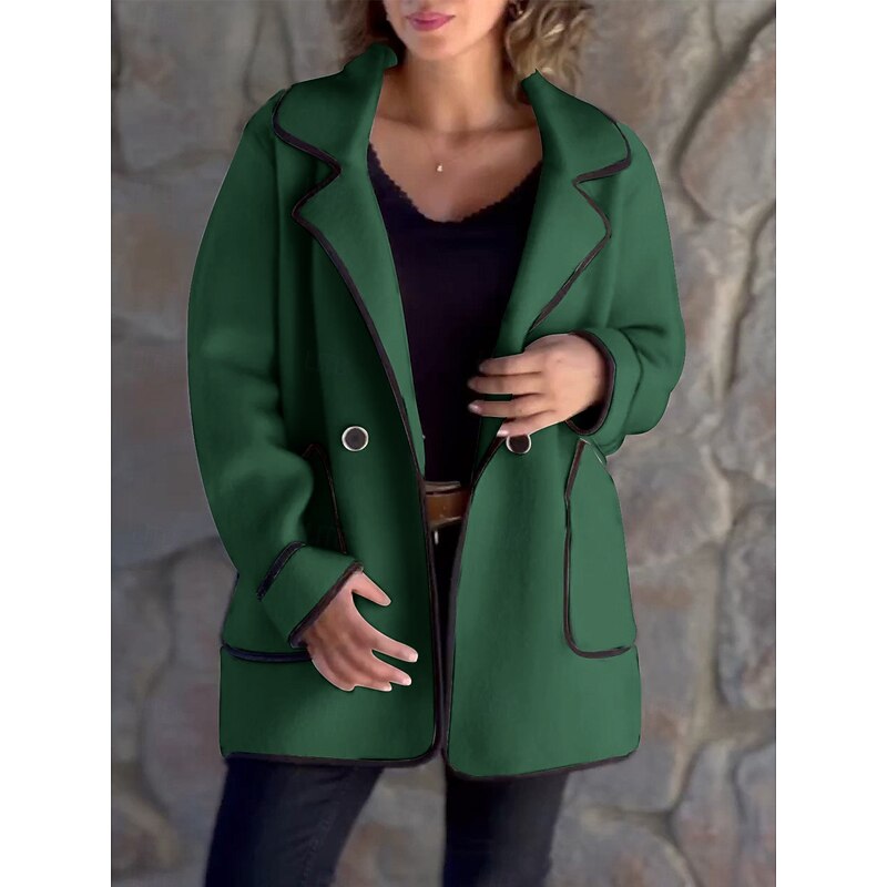 Oversized coat with contrast trim, product still life