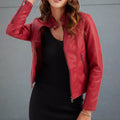 Red faux leather jacket for women with zipped pockets and regular fit