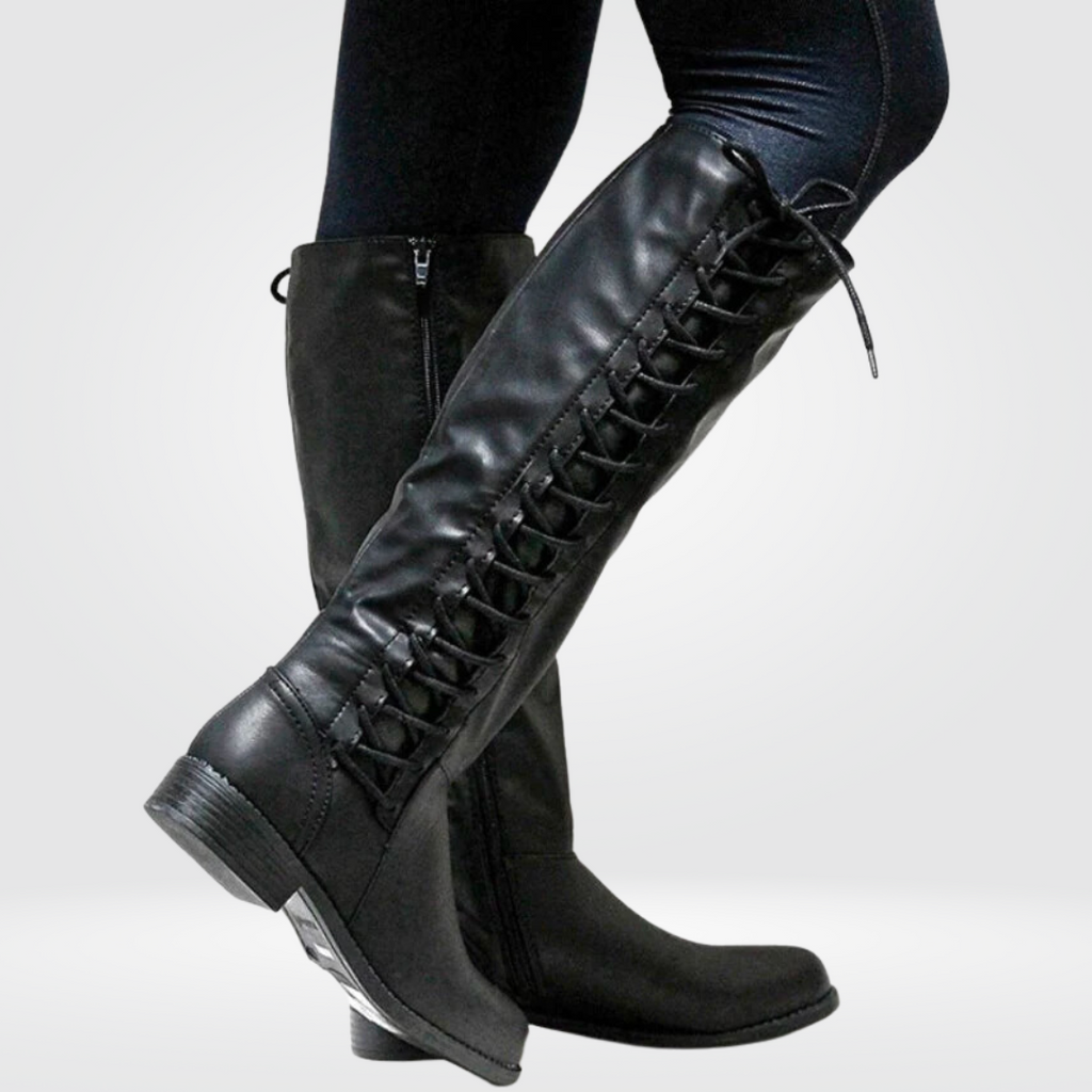 Women's black knee high boots with a block heel in faux leather